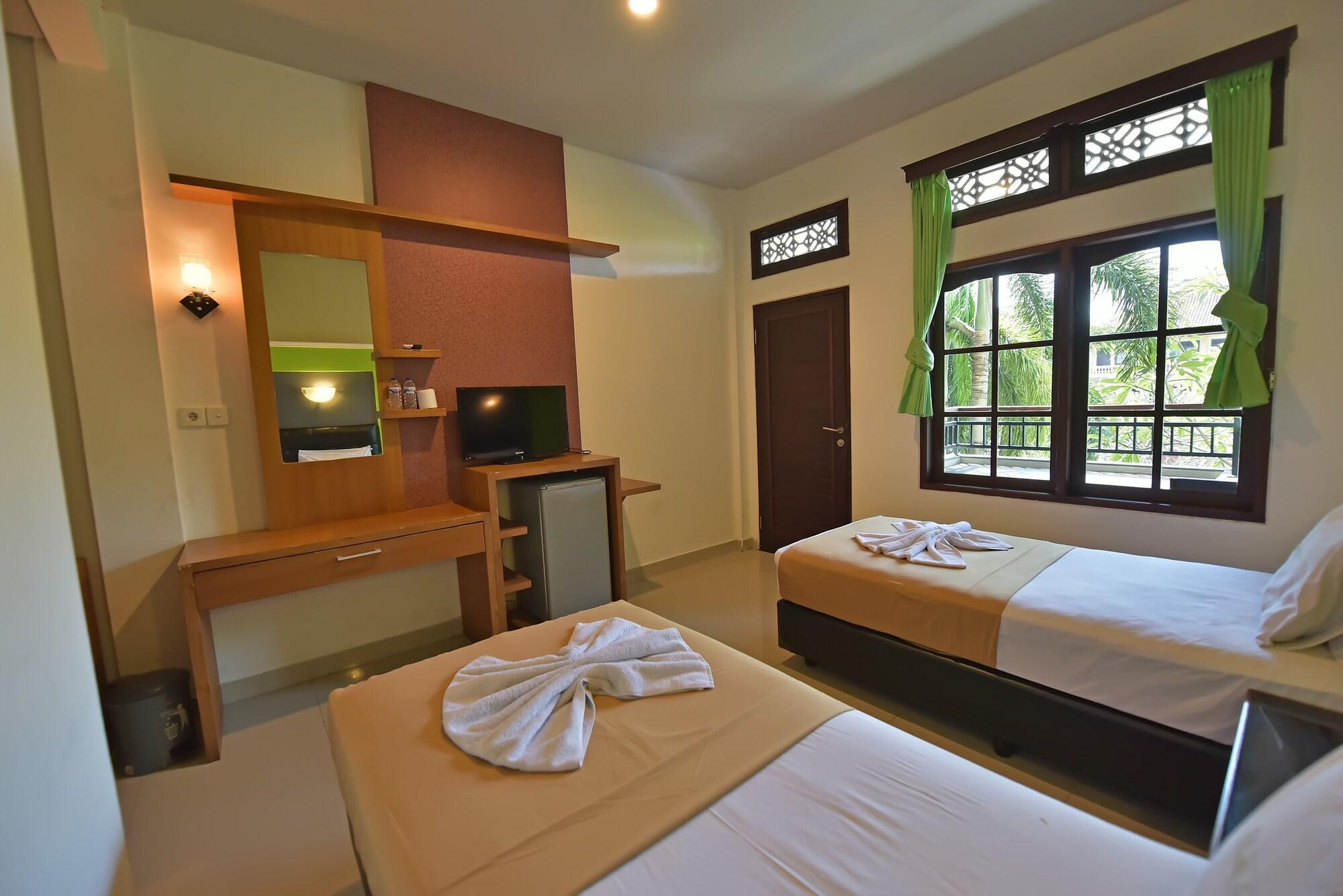 Sandat Hotel Kuta Кута Экстерьер фото