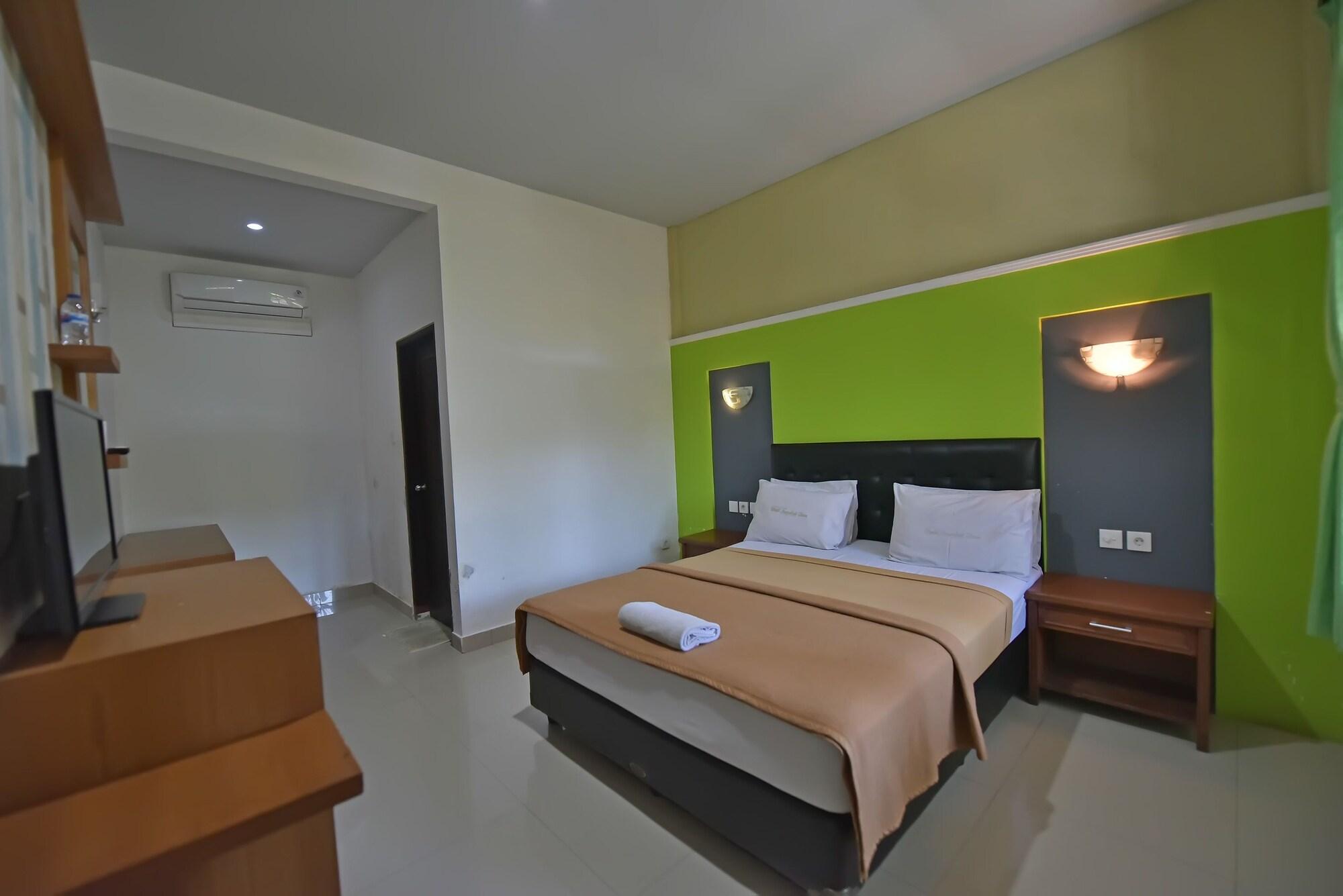 Sandat Hotel Kuta Кута Экстерьер фото