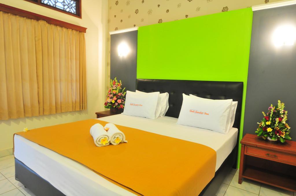 Sandat Hotel Kuta Кута Номер фото